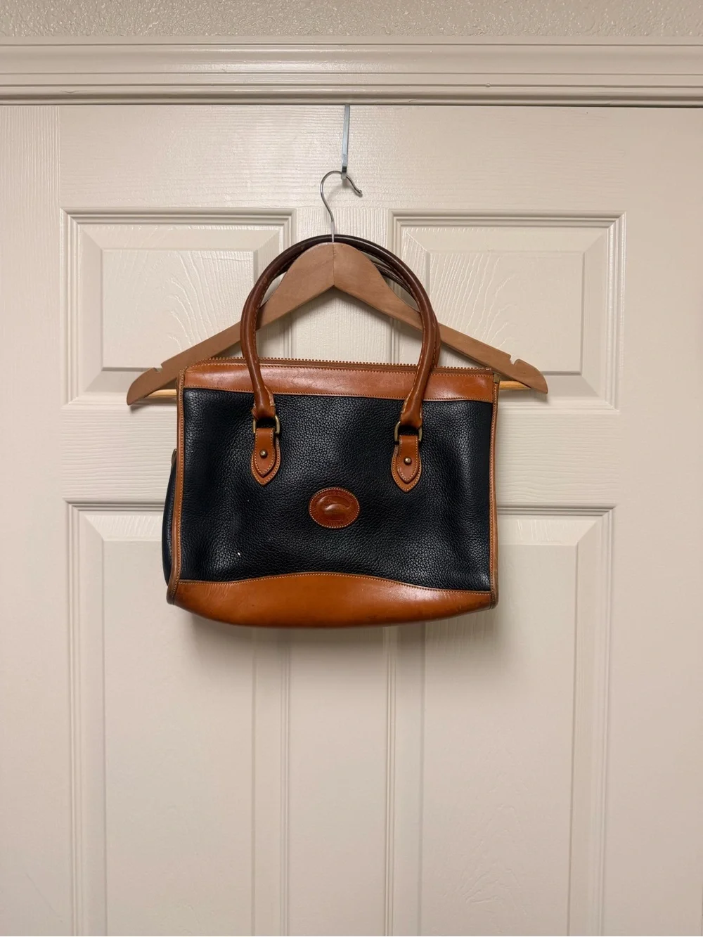 Dooney & Bourke Black and Tan Leather Satchel